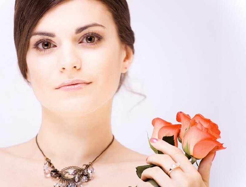 woman holding roses