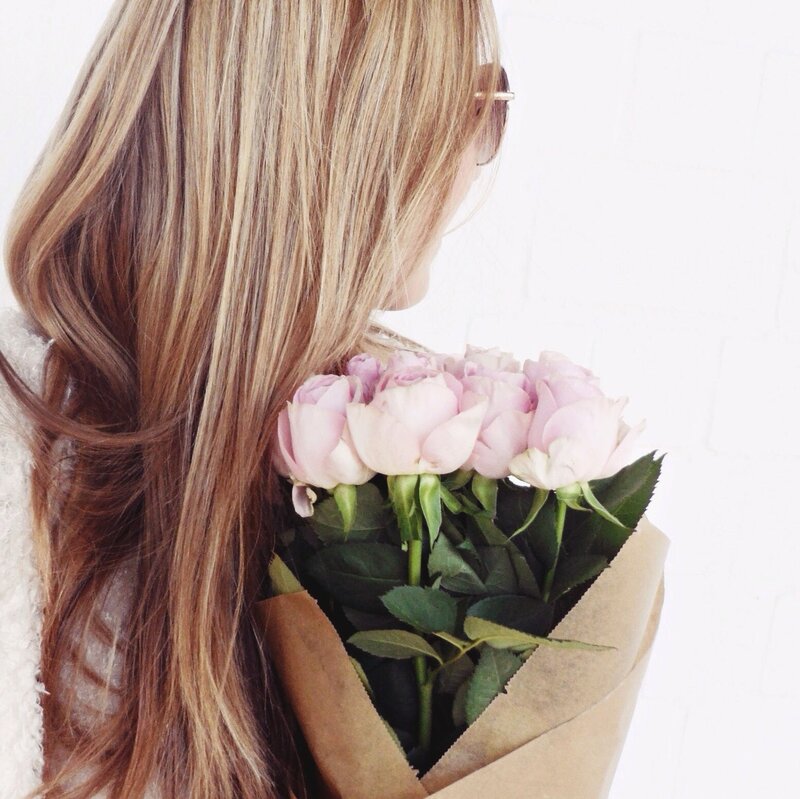 Woman Holding Roses — Blonde