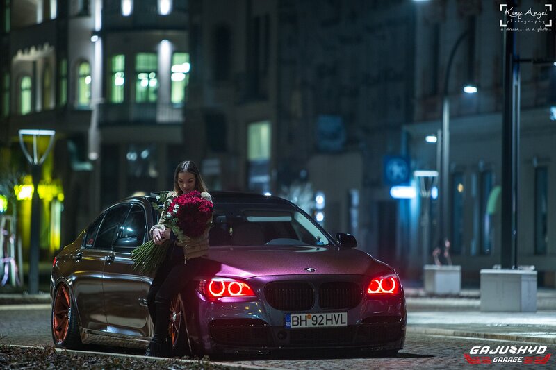 Woman Holding Roses by Car