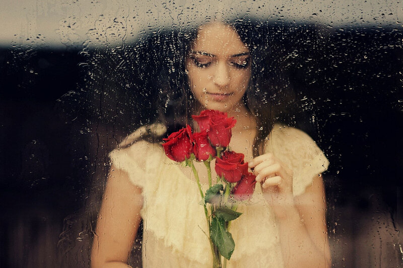 Woman Holding Roses — Red, Melancholic, Photograph