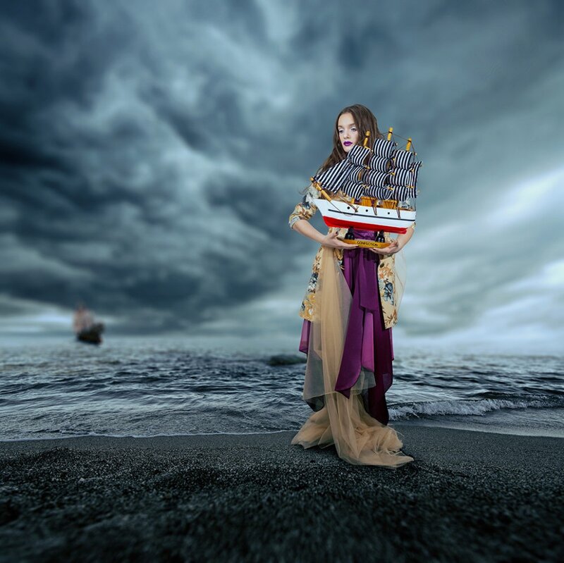 Woman Holding Ship Model — Gray