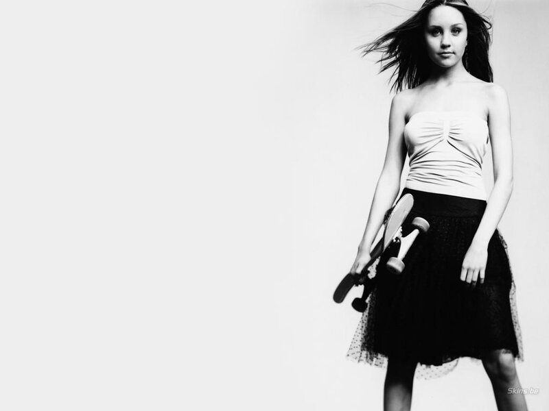 woman holding skateboard