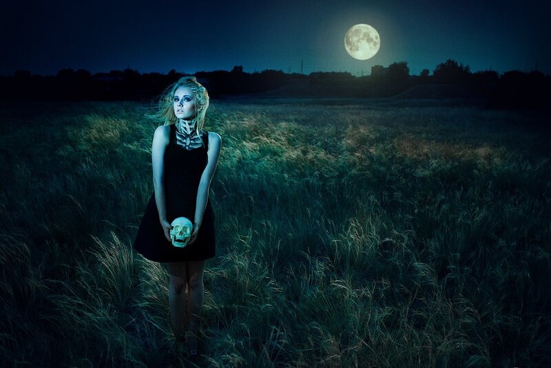 Woman Holding Skull — Blue