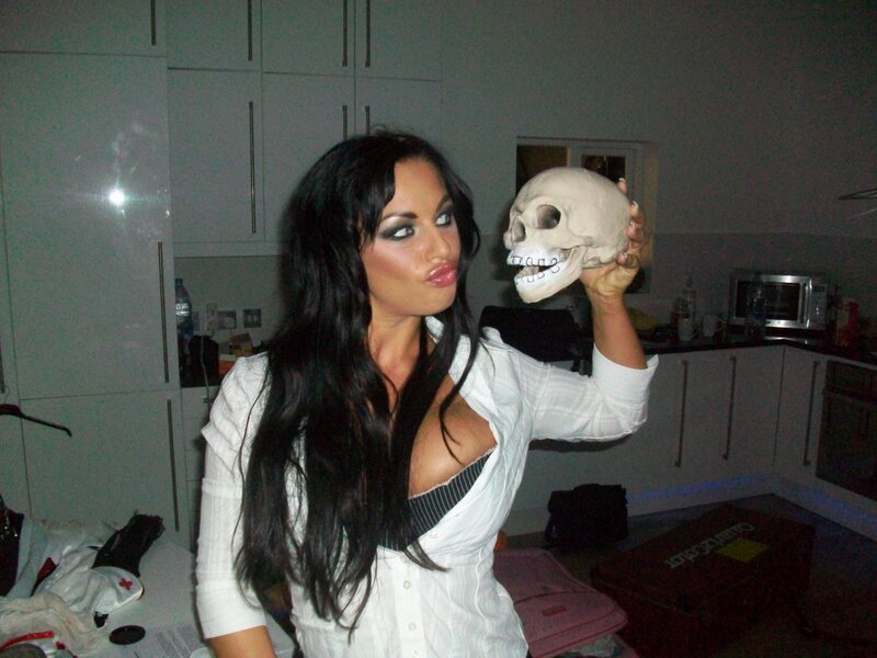 woman holding skull prop