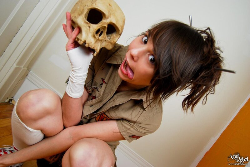 woman holding skull prop