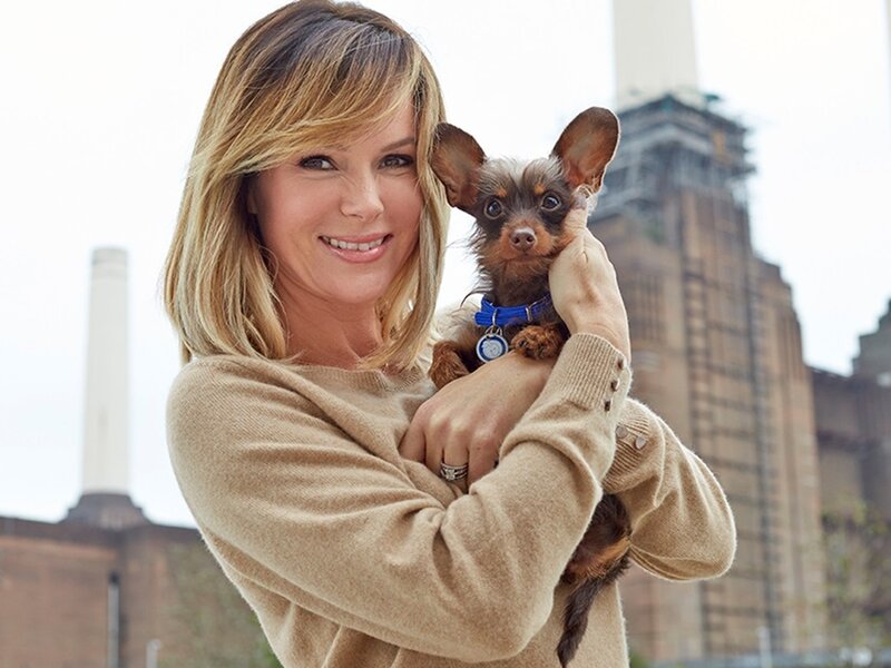 Woman Holding Small Dog — Beige
