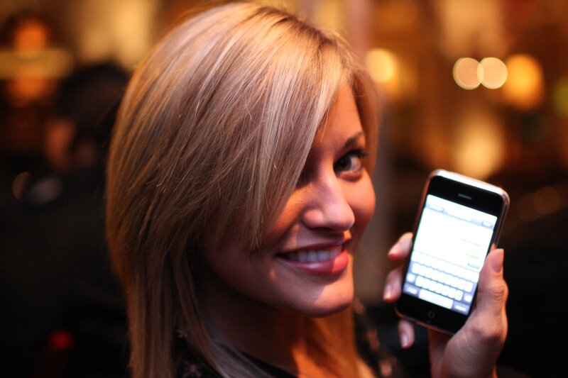 woman holding smartphone
