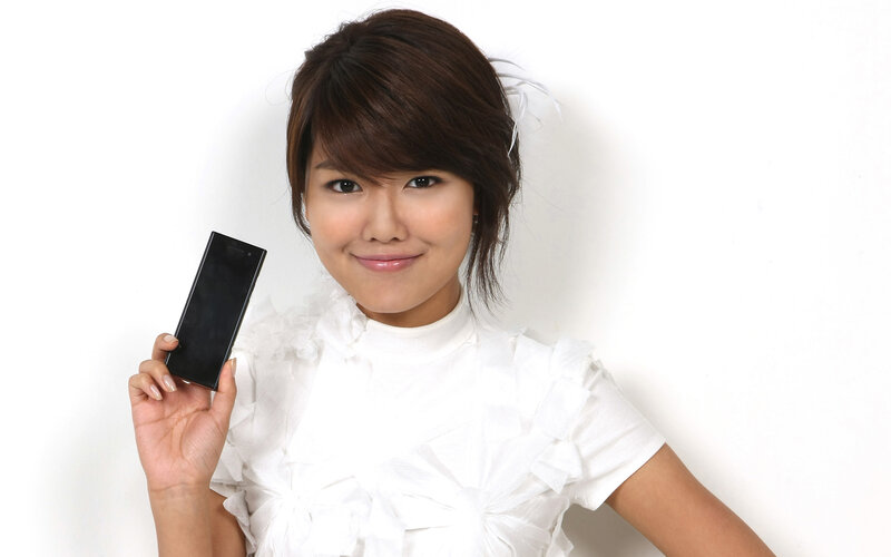 woman holding smartphone