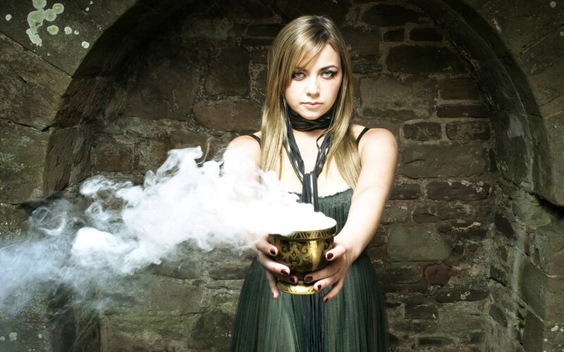 woman holding smoking bowl