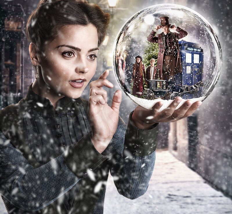 Woman Holding Snow Globe — Blue