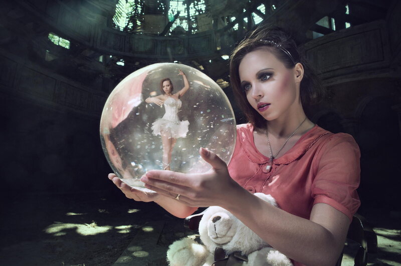 Woman Holding Snow Globe — Pink