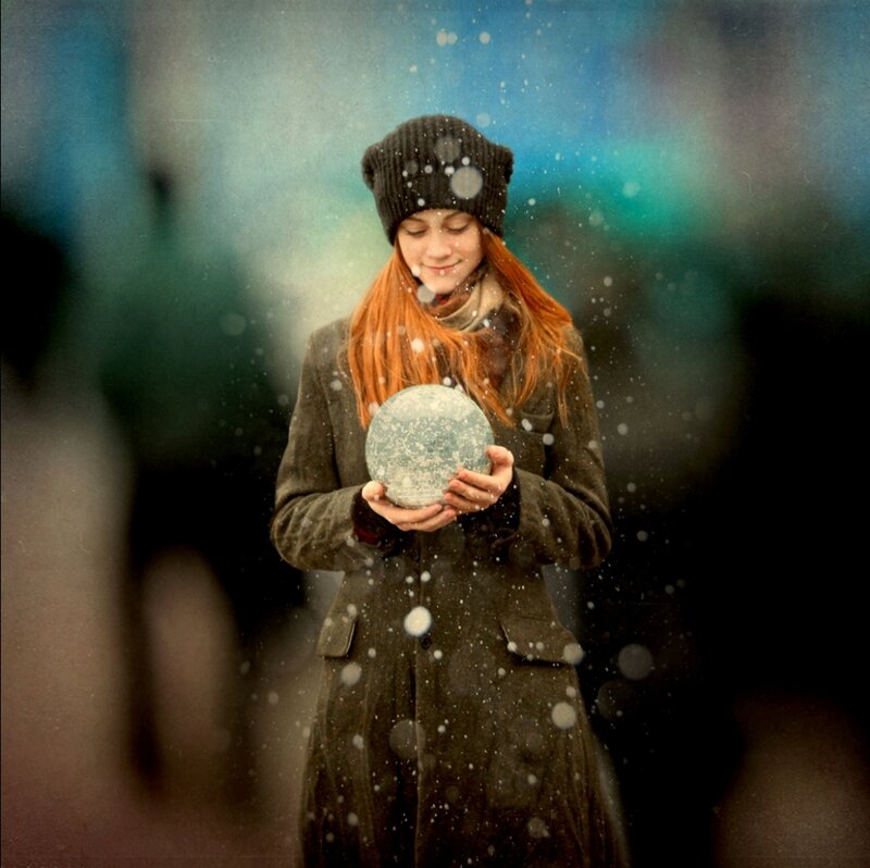 Woman Holding Snowball — Brown