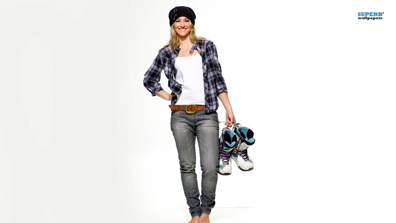 Woman Holding Snowboard Boots