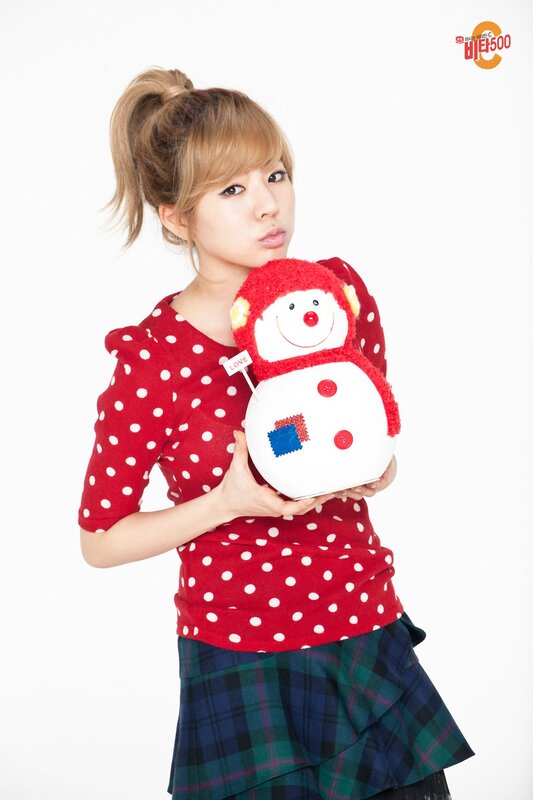woman holding snowman plush