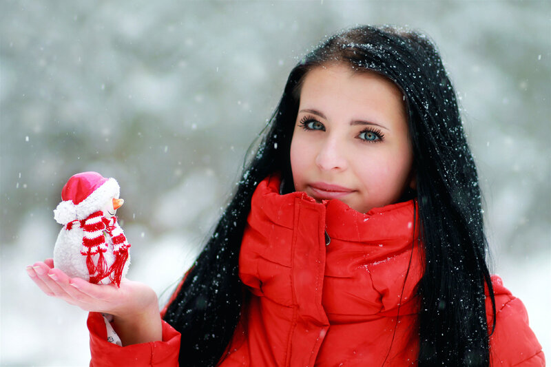 Woman Holding Snowman