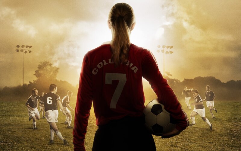 Woman Holding Soccer Ball — Red, Dramatic, Sunset