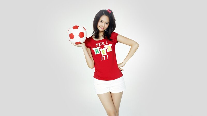 Woman Holding Soccer Ball — Red