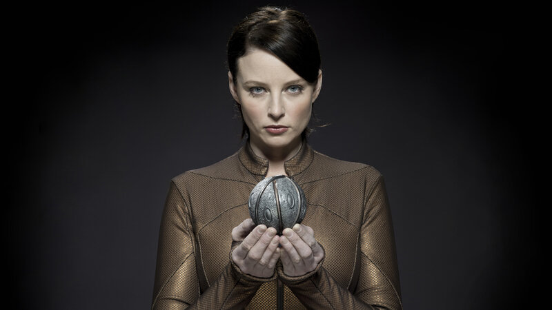 Woman Holding Sphere