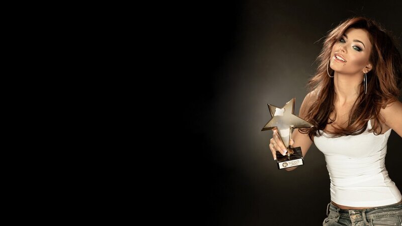woman holding star award