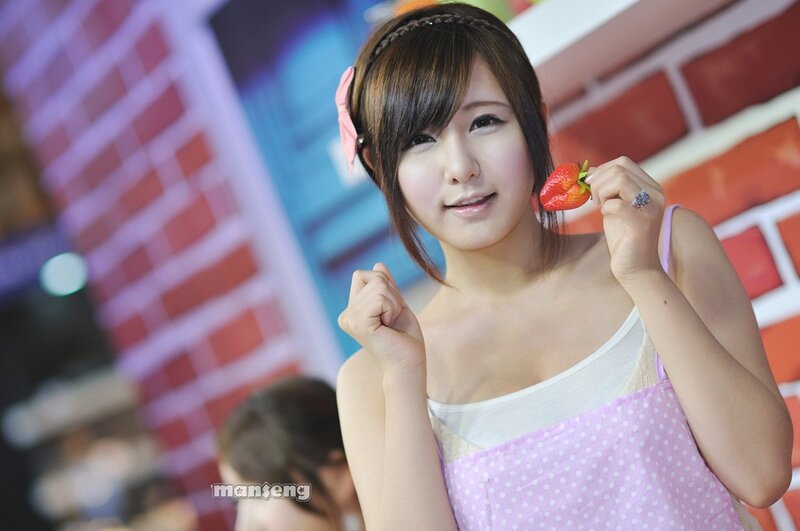 Woman Holding Strawberry — Pink, Playful