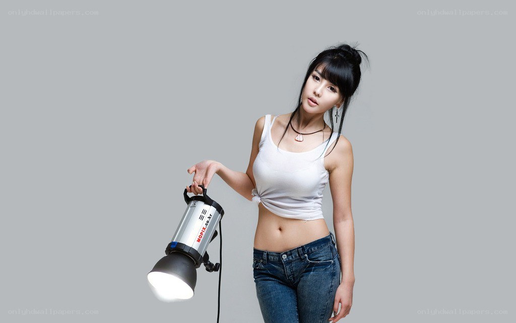 Woman holding studio light