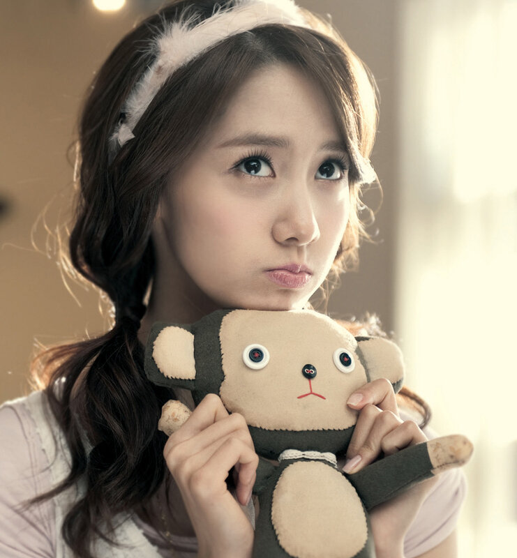 woman holding stuffed animal