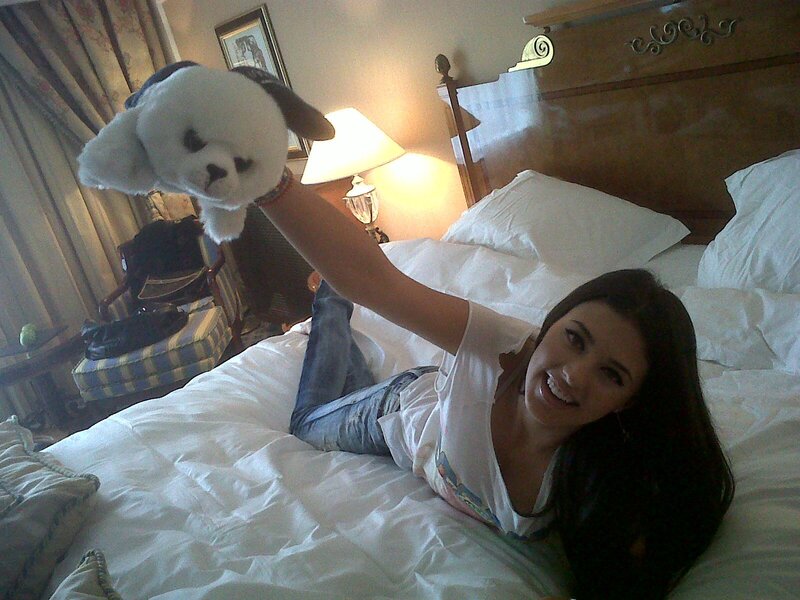Woman Holding Stuffed Animal — White