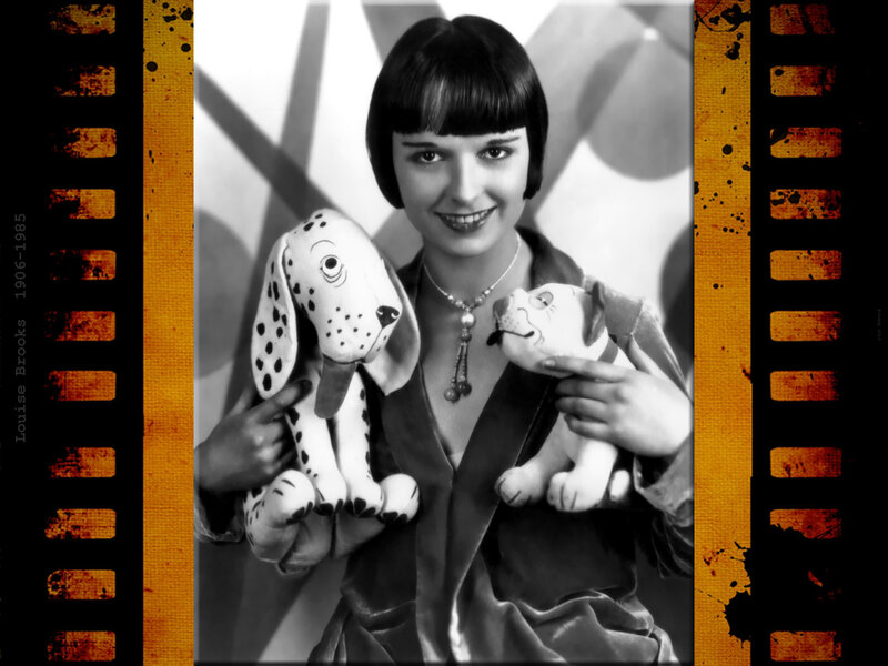Woman Holding Stuffed Dogs