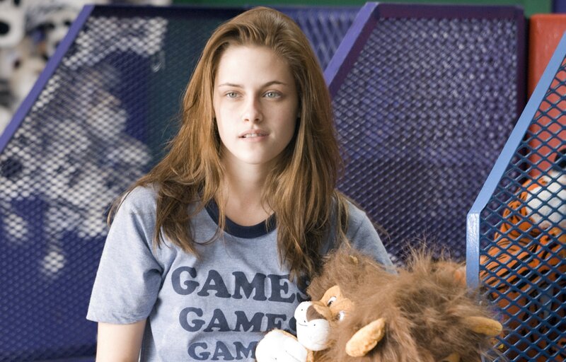 woman holding stuffed lion