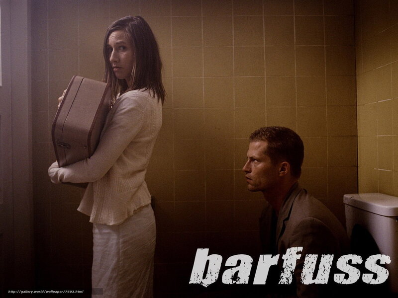 woman holding suitcase in bathroom