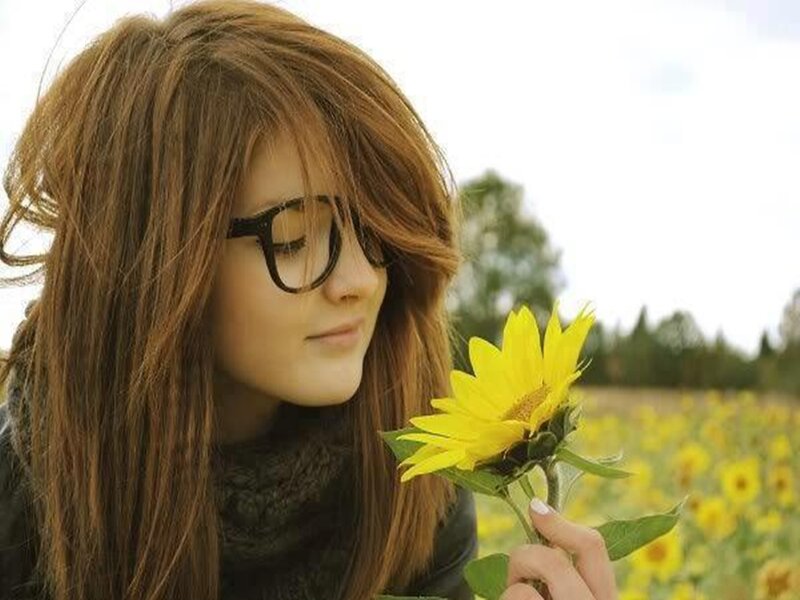 Woman Holding Sunflower — Yellow