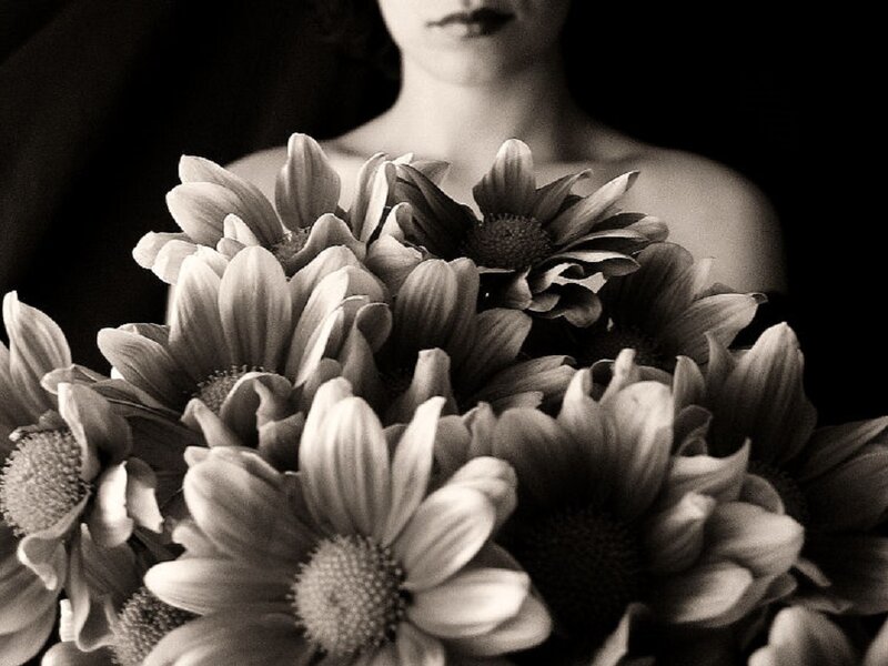Woman Holding Sunflowers — Black