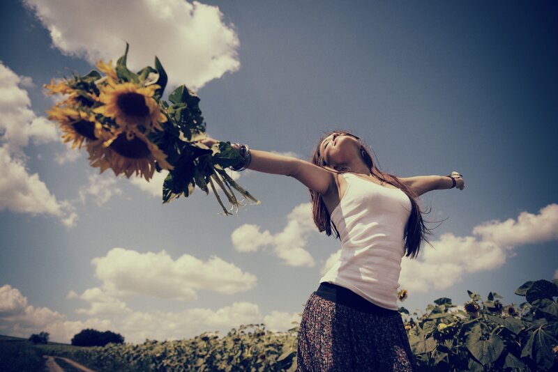 Woman Holding Sunflowers — Blue, Serene