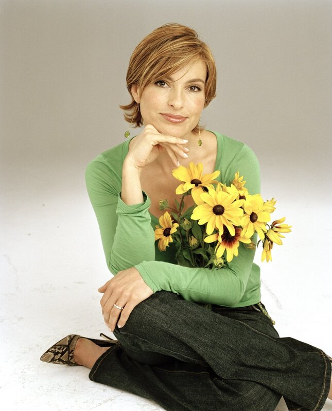 woman holding sunflowers