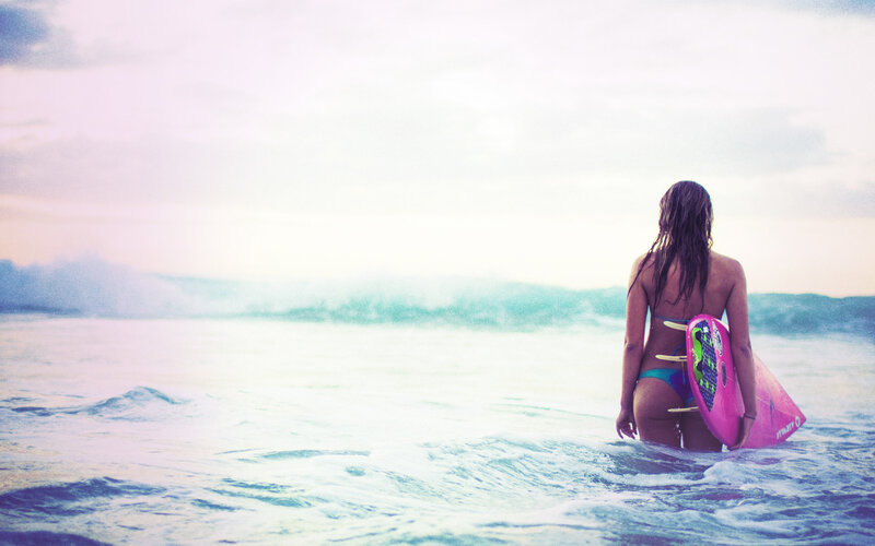 Woman Holding Surfboard — Blue, Serene, Sunset