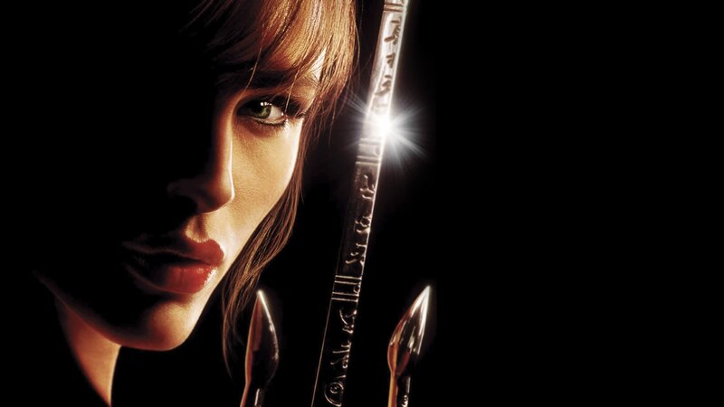 Woman Holding Sword — Black, Dramatic, Photograph, Face