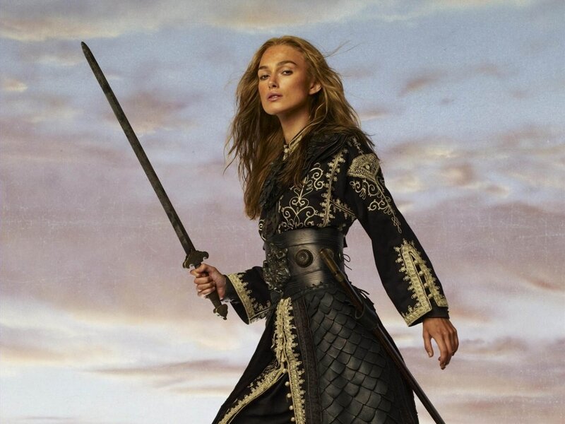 Woman Holding Sword — Black, Dramatic, Sunset