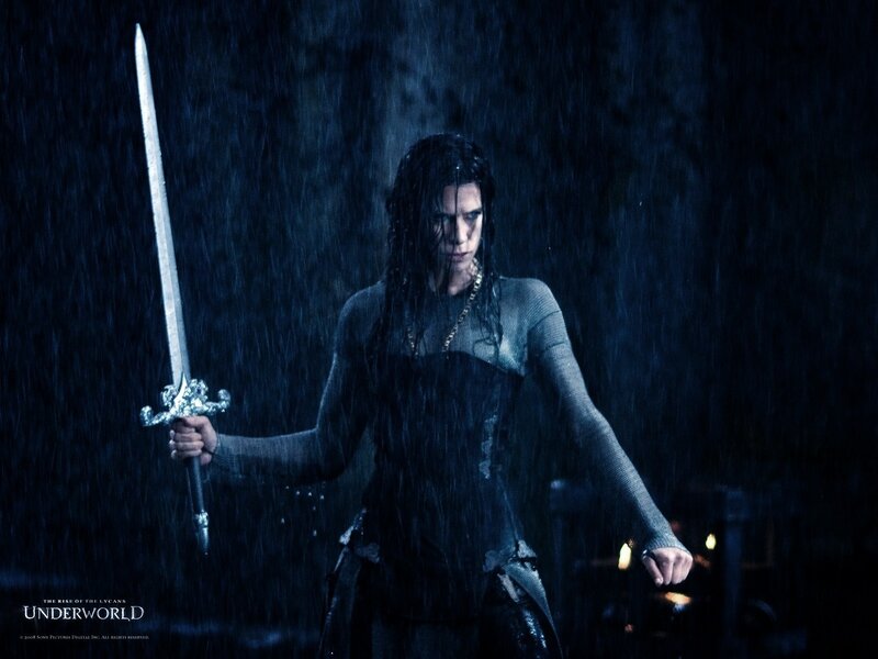 Woman Holding Sword — Blue, Dramatic