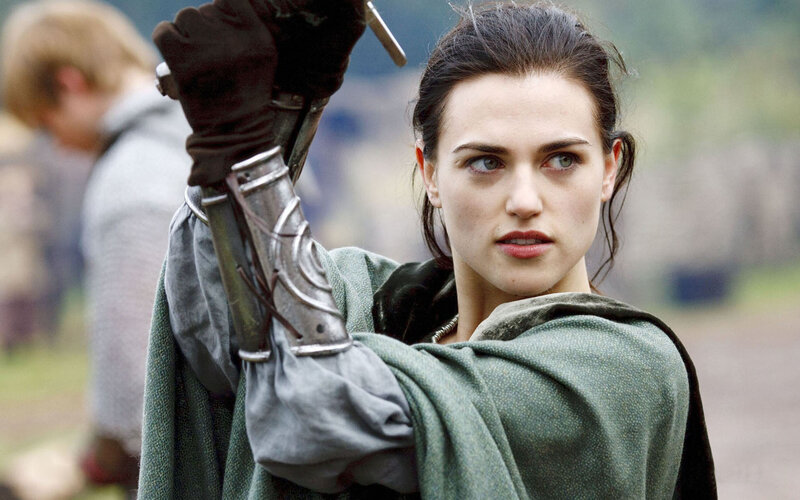 Woman Holding Sword — Green