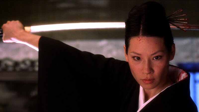 woman holding sword in action pose