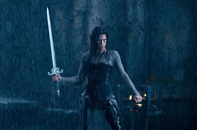 woman holding sword in rain