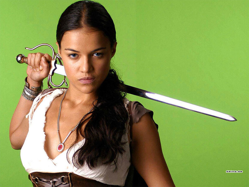woman holding sword on green screen