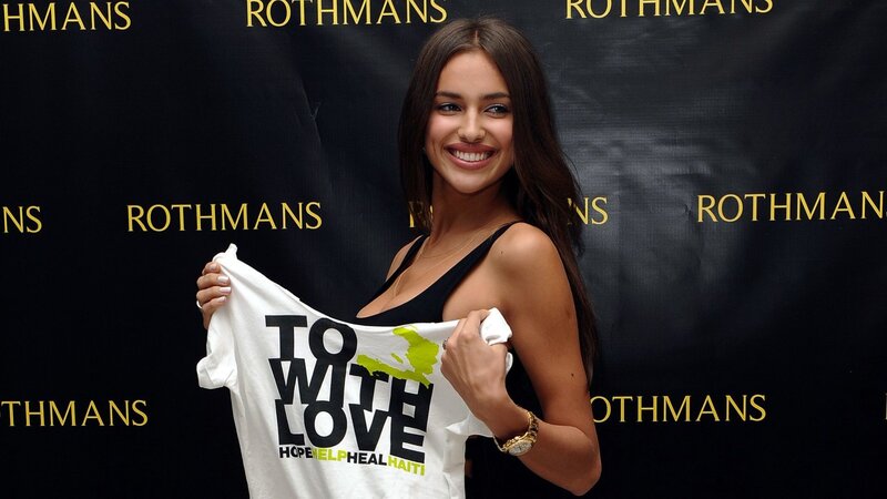 Woman Holding T-shirt — Black
