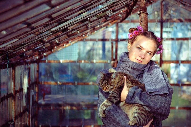 Woman Holding Tabby Cat