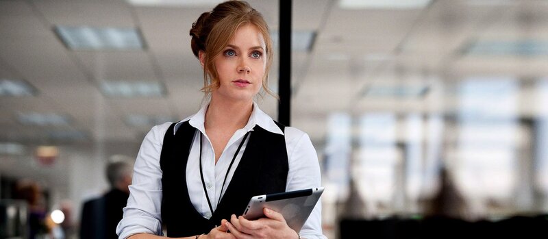 woman holding tablet in office