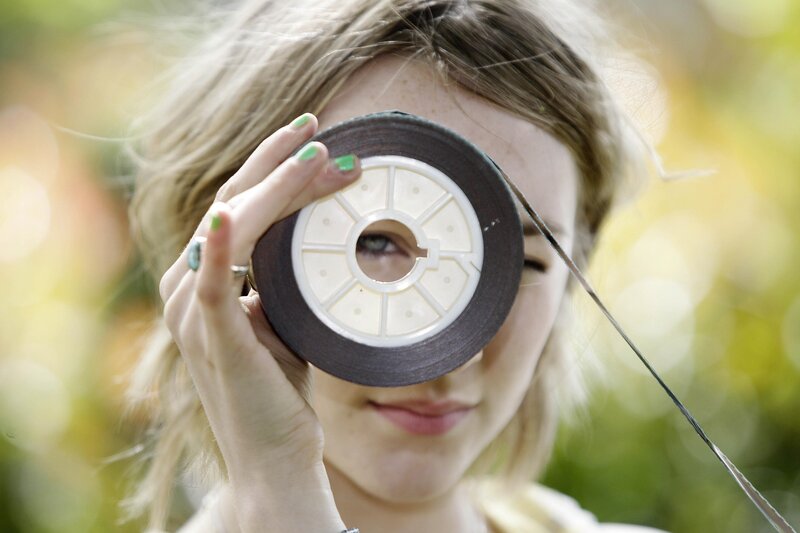woman holding tape roll