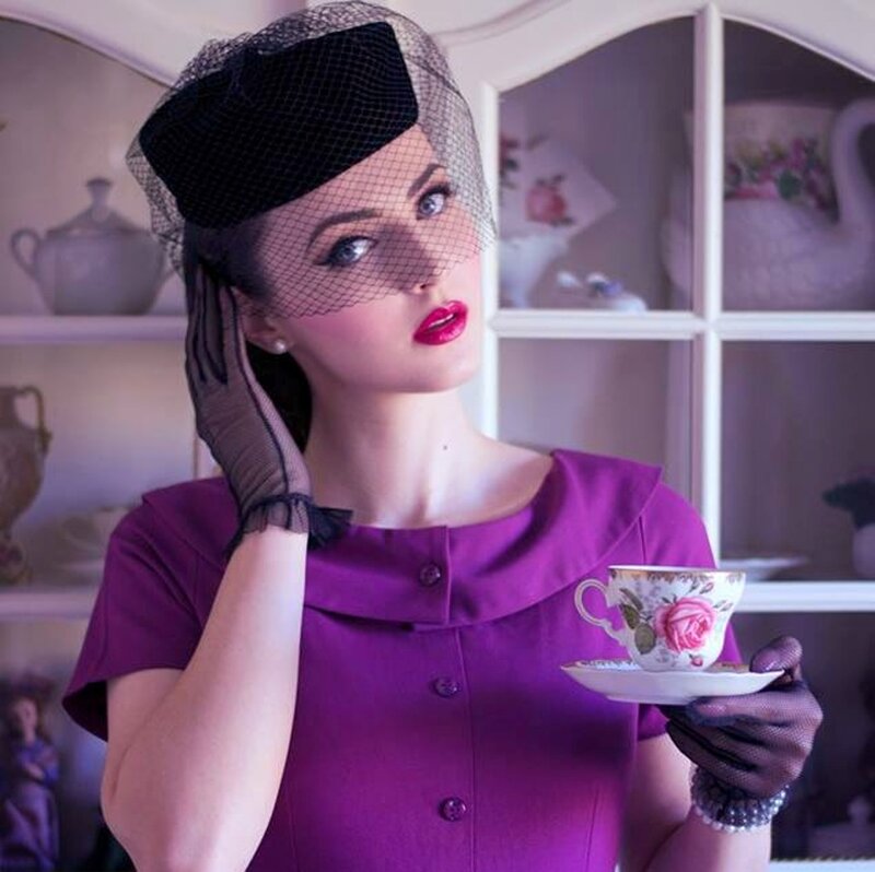 Woman Holding Tea Cup — Purple, Dramatic
