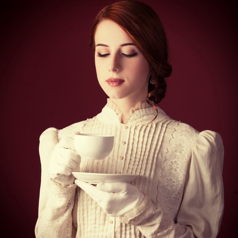 Woman Holding Tea Cup — White