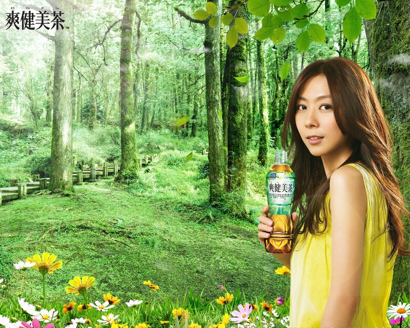 woman holding tea in forest