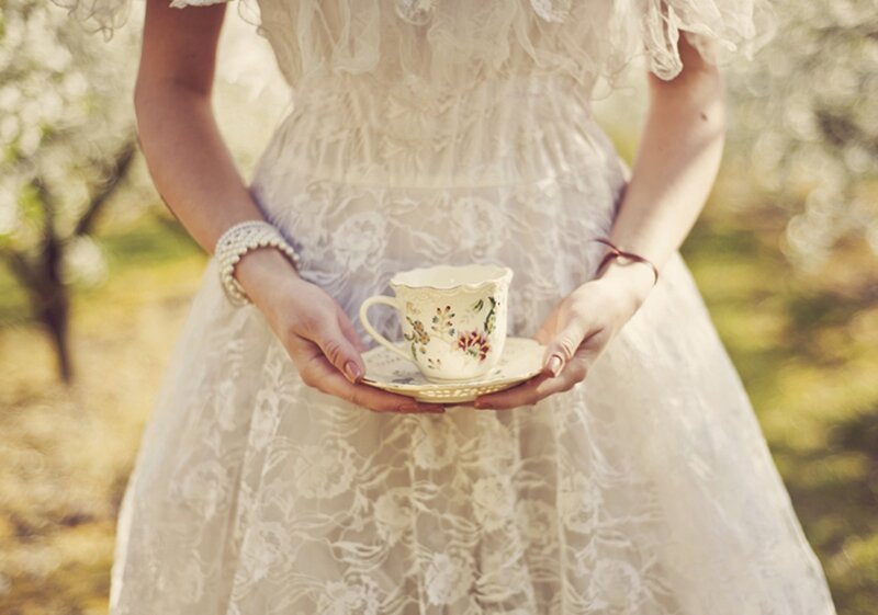 Woman Holding Teacup